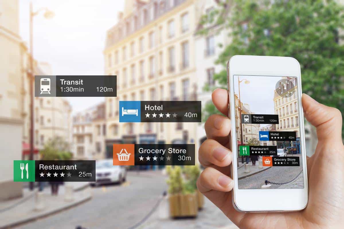 Augmented reality in travel & tourism shown on a smartphone, highlighting city details.