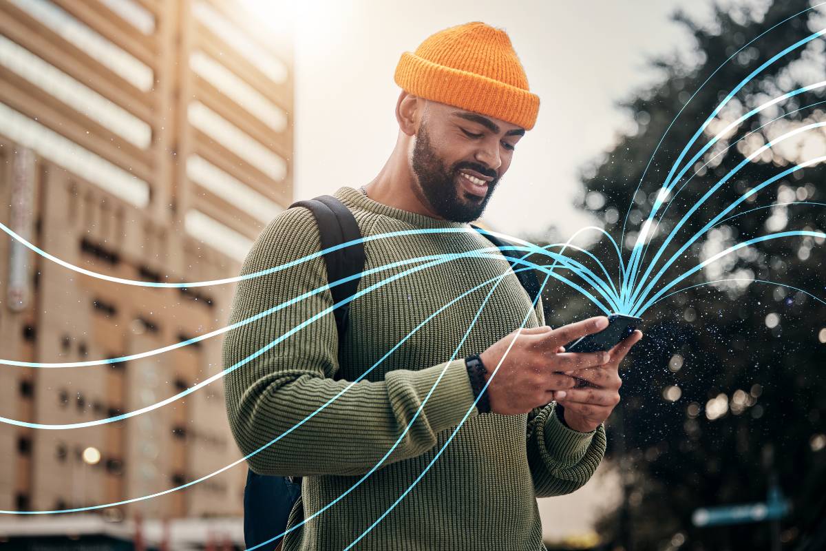 A traveler engaging with their smartphone, visualizing connections powered by predictive analytics within a loyalty program.